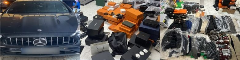 범죄단체 조직원들이 범죄 수익으로 구매한 외제 차를 비롯해 수괴 A씨 주거지에서 압수한 100여 점의 명품 의류, 가방, 신발 [서울동부지검 제공]