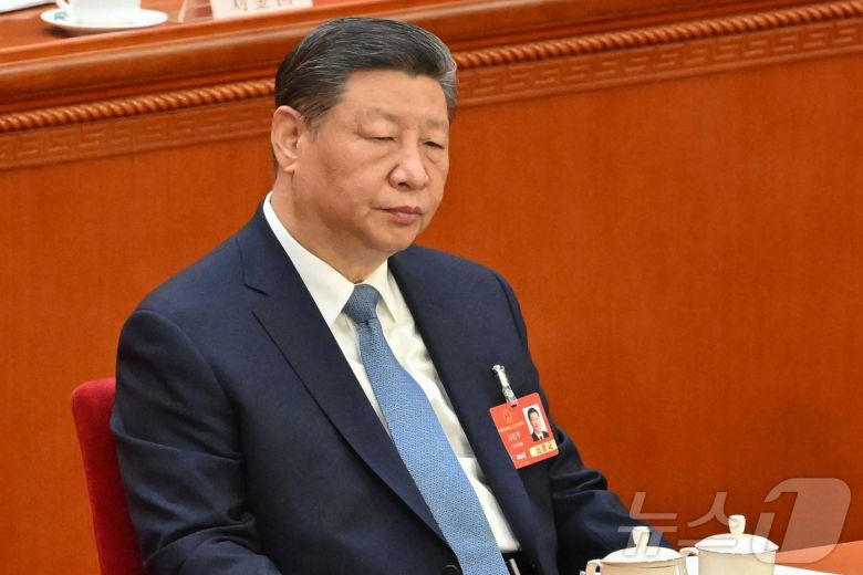 시진핑 중국 국가주석이 8일(현지시간) 베이징 인민대회당에서 열린 전국인민대표대회(전인대) 둘째 날 회의에 참석을 하고 있다. 2025.03.08 ⓒ AFP=뉴스1 ⓒ News1 우동명 기자