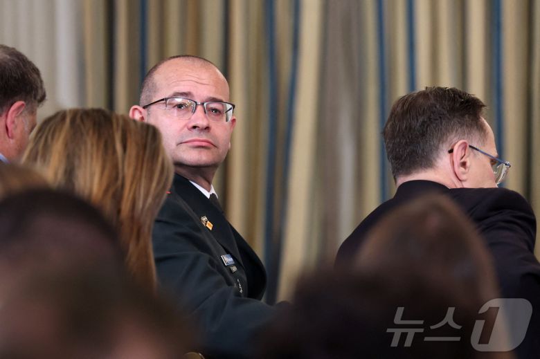 지난 9월 29일(현지시간) 백악관에서 열린 도널드 트럼프 미국 대통령과 베냐민 네타냐후 이스라엘 총리의 공동 기자회견에 참석한 로만 고프만 당시 이스라엘 총리실 군사비서관. 2025.09.29 ⓒ 로이터=뉴스1 ⓒ News1 김지완 기자