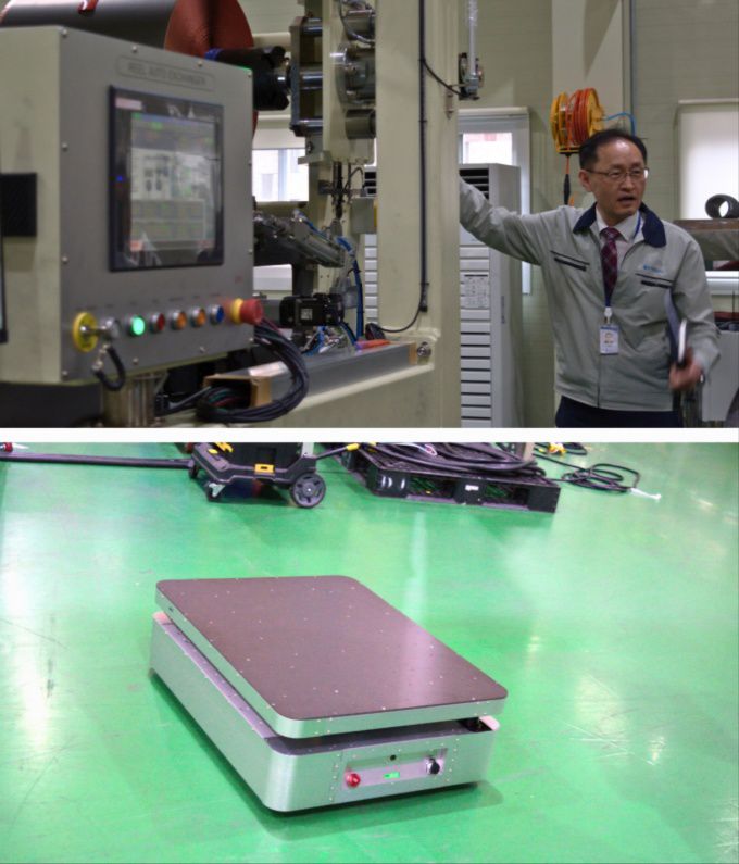 전극 자동 공급 장비를 설명하고 있는 고강호 엠플러스 기전무이사(위)와 자율주행로봇(AMR).