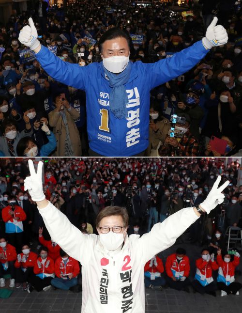 더불어민주당 김영춘 부산시장 후보와 국민의힘 박형준 후보가 6일 오후 부산진구 서면에서 열린 피날레 유세에서 각각 손으로 자신의 기호를 표시하고 있다. 연합뉴스