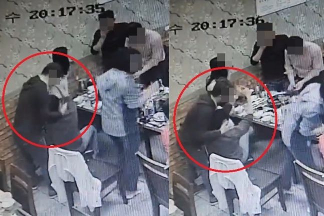 지난달 전남 순천 한 식당에서 민주당 소속 남성 부천시의원이 국민의힘 여성 시의원의 목을 끌어안는 모습. 연합뉴스