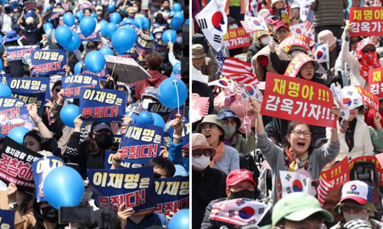 서초동 ‘맞불집회’ 더불어민주당 이재명 대표의 공직선거법 2심 선고 공판이 열린 26일 서울 서초구 서울중앙지방법원 인근에서 이 대표 지지자들(왼쪽)과 이 대표 구속을 촉구하는 이들의 집회가 동시에 열리고 있다. 서울고등법원은 이날 이 대표의 공직선거법상 허위사실 공표 혐의에 대해 유죄를 선고한 1심을 뒤집고 무죄를 선고했다. 연합뉴스