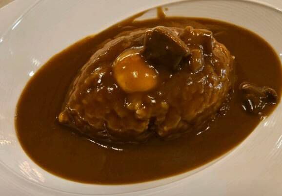 1만원짜리 기본 카레에 500원 추가해 계란 노른자를 얹은 ‘가래’의 메뉴 사진. 네이버 지도 갈무리