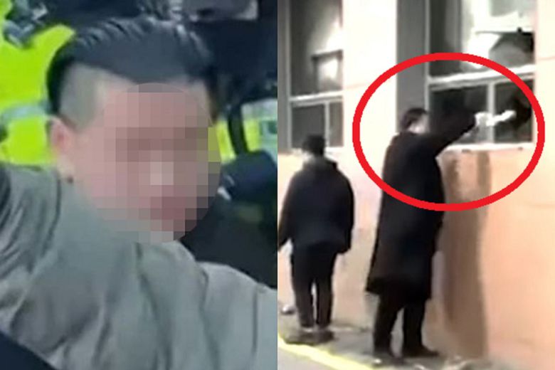 지난 1월19일 서울 마포구 서울서부지법에 침입한 일명 ‘투블럭남’이 불 붙은 종이를 법원 내부로 던지고 있다. MBC 보도화면 캡처