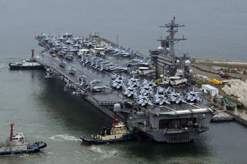 The USS Theodore Roosevelt, a nuclear-powered aircraft carrier, is seen at a naval base in the southeastern port city of Busan on June 22, 2024. Source: EPA Yonhap