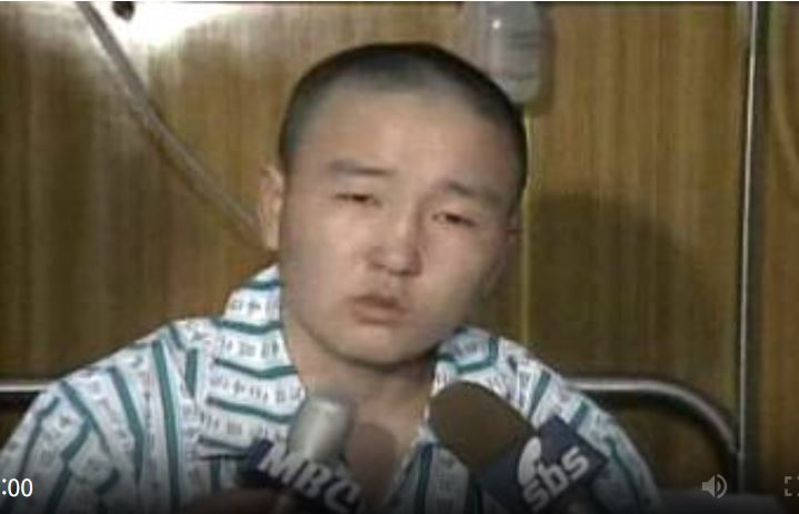 북한군 김철진 하사가 국군수도병원에서 치료를 받던 도중 고향에 돌아가겠다는 입장을 밝히고 있다.