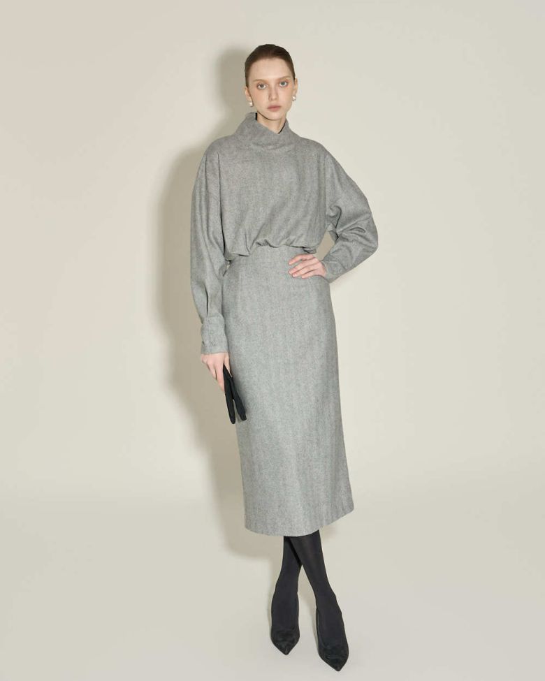 이부진 이사장이 착용한 브랜드 딘트의 하이넥 울 원피스. 뉴스1