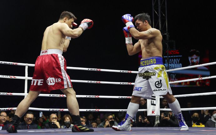 웰바이오텍이 투자한 매니 파키아오와 DK 유의 스페셜 매치가 지난 2022년 12월 열렸다.[사진｜연합뉴스]