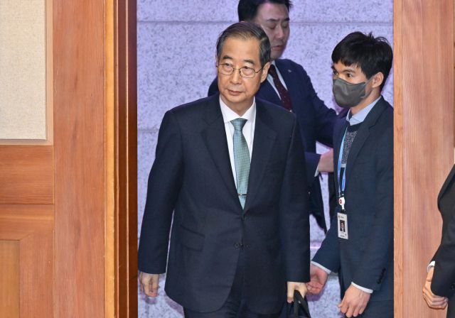 ▲ 한덕수 국무총리가 2월 19일 헌법재판소 첫 변론기일에 출석하는 모습. ⓒ연합뉴스