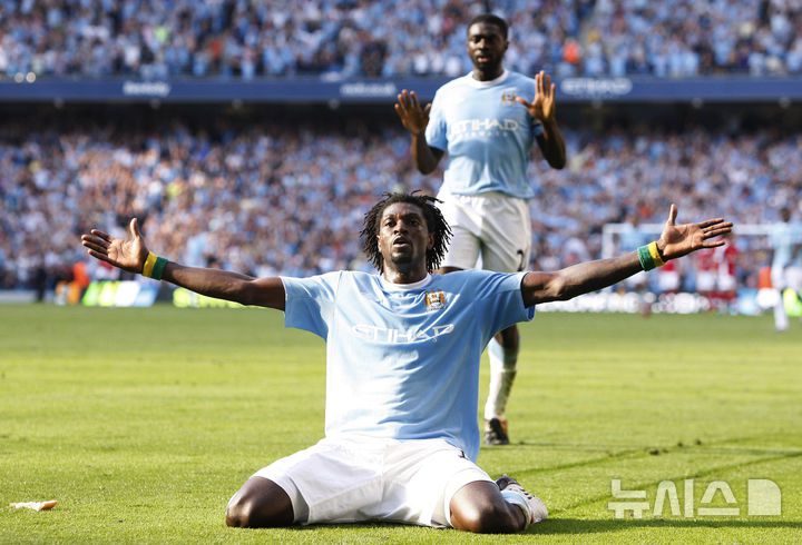 [맨체스터=AP/뉴시스]아데바요르 역주행 세리머니. 2009.10.01.