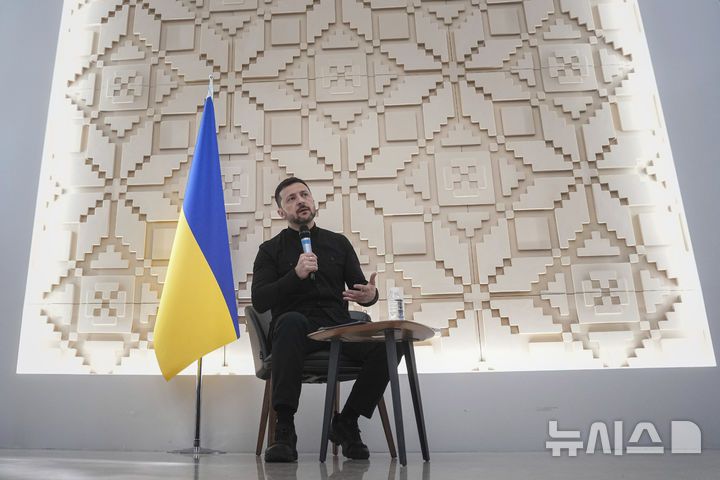 Ukrainian President Volodymyr Zelenskyy talks to journalists at the Ukrainian Embassy in Ankara, Turkey, Thursday, May 15, 2025. (AP Photo/Evgeniy Maloletka)