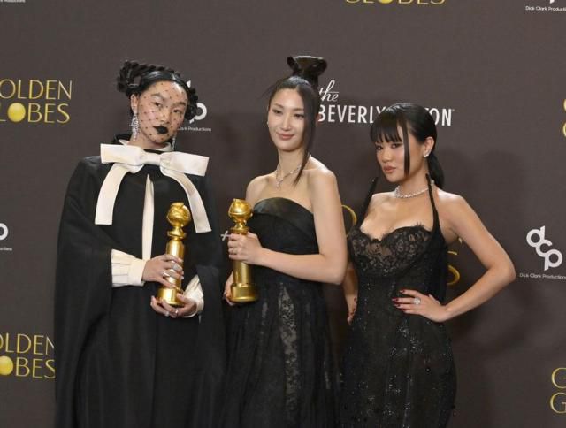 American singer and rapper Audrey Nuna (far left), South Korean-American singer-songwriter Ejae (center), and South Korean singer and rapper Rei Ami pose for a photo after winning an award at the annual Golden Globes in Beverly Hills, California on Jan. 11, 2026. UPI-Yonhap