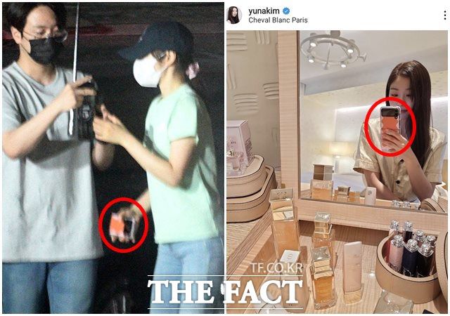 우산에 가려져 분간이 쉽지 않았지만 두 사람의 차량, 그리고 김연아가 들고 있는 독특한 문양이 그려진 폰 케이스만으로 금방 확인이 가능했다. /남윤호 기자